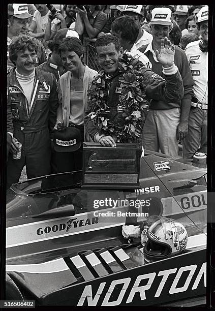 Lake Pocono, PA: Bobby Unser of Albuquerque, New Mexico poses for photographers along with his wife Marsha after winning the Pocono 500 here 6/22....