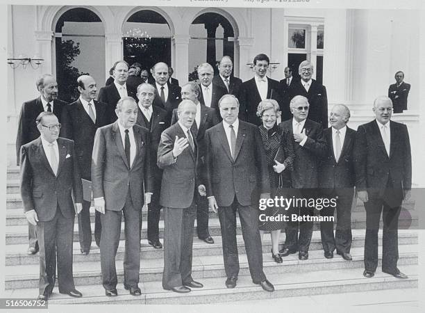 Bonn, West Germany: West German president Karl Carstens poses with the new Kohl-Genscher cabinet for a family picture at Carstens' residence 10/4....