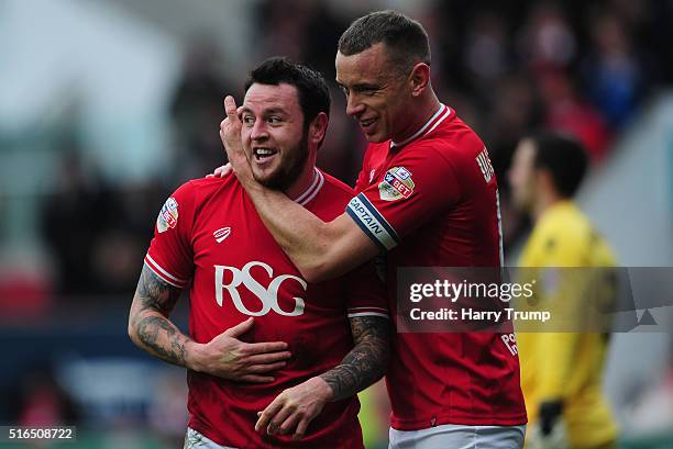 Lee Tomlin of Bristol City celebrates his sides second goal with Aaron Wilbraham of Bristol City during the Sky Bet Championship match between...
