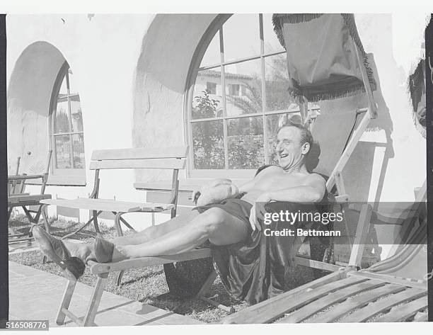 Enjoying the Warm Sun at Palm Springs. Palm Springs, California: Jimmy Durante enjoying the warm sunshine at El Mirador Hotel, Palm Springs,...