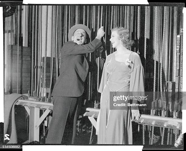 Jimmy Durante, popular comedian, and Ginger Rogers, a 1932 Wampas Baby Star, shown as they attended the 19th Annual Christmas Benefit of a Los...