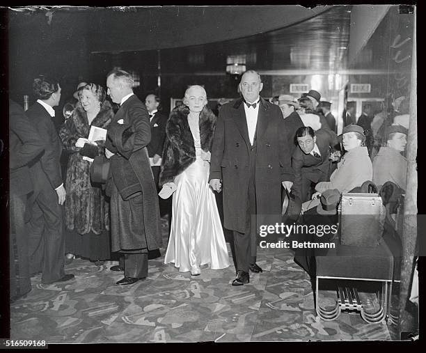 Mr. And Mrs. Walter p. Chrysler seen as they arrived to attend the formal opening of Radio City Music Hall, New York on December 27th. 6,200 persons,...