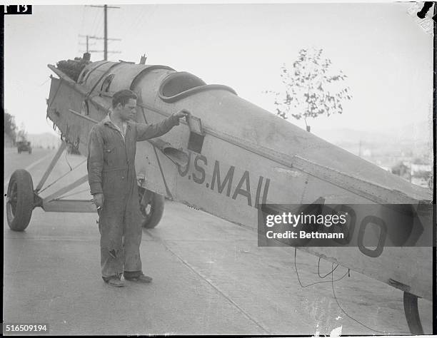Los Angeles, California: "Old 400" Plane Goes To Graveyard. Old four-hundred air mail plane that has flown more than a million miles for the Postal...
