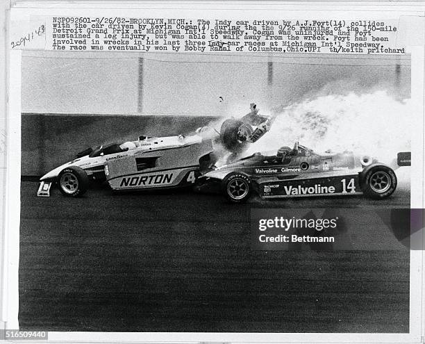 The Indy car driven by A.J. Foyt collides with the car driven by Kevin Cogan during the 9/26 running of the 150-mile Detroit Grand Prix at Michigan...