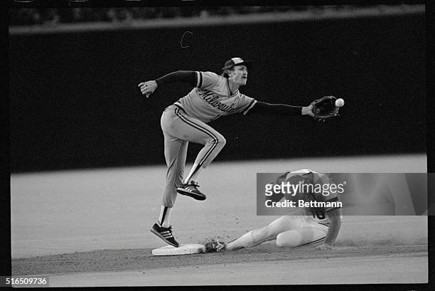 St. Louis: St. Louis Cardinals' Ken Oberkfell steals second base on this sixth inning action October 13. Milwaukee shortstop Robin Yount leaps to...