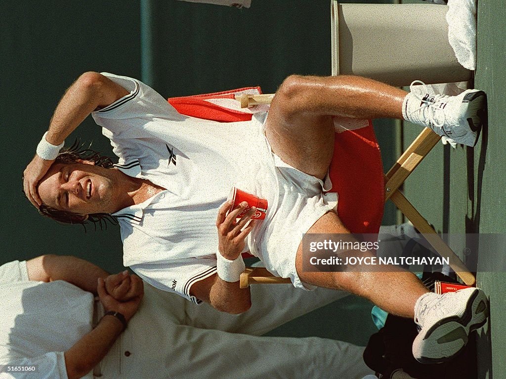 Patrick Rafter Us Open US Open champion Patrick Rafter, of Australia, sits down after losing ...