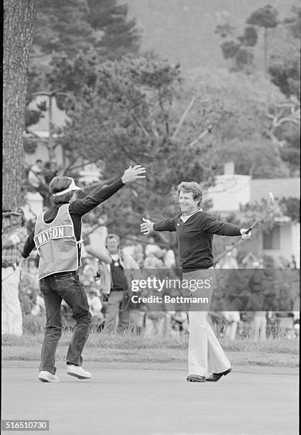 Pebble Beach, California: Winner of the United States Open Tom Watson and his caddy Bruce Edwards rush to embrace each other on the 18th green, after...