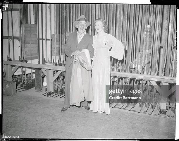 Jimmy Durante, popular comedian, and Ginger Rogers, a 1932 Wampas Baby Star, shown as they attended the 19th Annual Christmas Benefit of a Los...