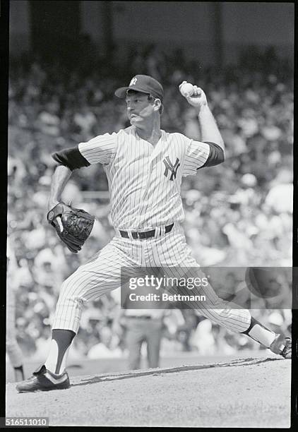 New York Yankees' Tommy John pitching against the California Angels at Yankee Stadium.