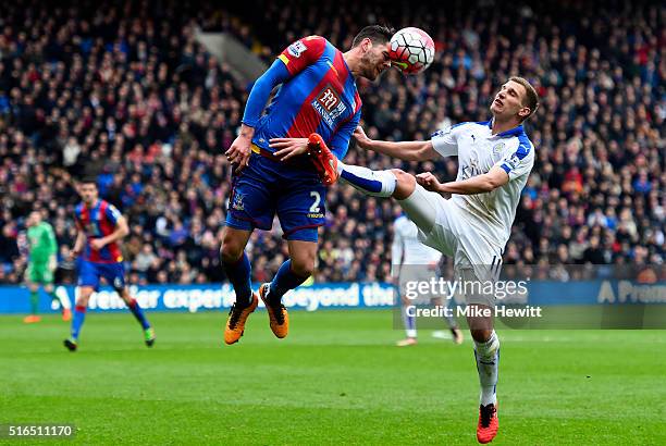 Joel Ward of Crystal Palace and Marc Albrighton of Leicester City compete for the ball during the Barclays Premier League match between Crystal...