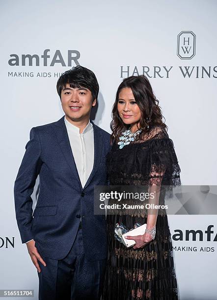 Lang Lang attends the 2016 amfAR Hong Kong gala with a guest at Shaw Studios on March 19, 2016 in Hong Kong, Hong Kong.