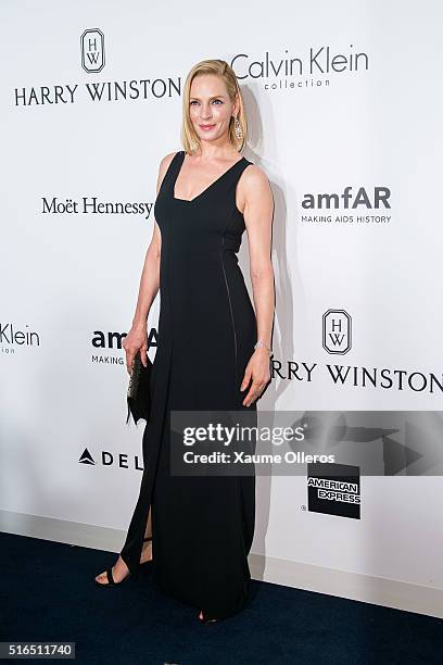 Uma Thurman attends the 2016 amfAR Hong Kong gala with a guest at Shaw Studios on March 19, 2016 in Hong Kong, Hong Kong.