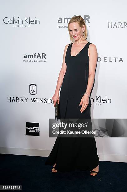 Uma Thurman attends the 2016 amfAR Hong Kong gala with a guest at Shaw Studios on March 19, 2016 in Hong Kong, Hong Kong.