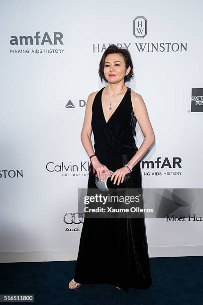 Rosamund Kwan attends the 2016 amfAR Hong Kong gala with a guest at Shaw Studios on March 19, 2016 in Hong Kong, Hong Kong.