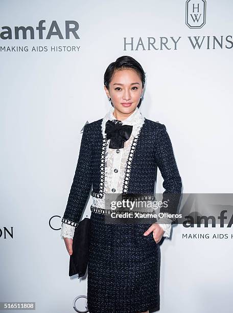 Zhou Xun attends the 2016 amfAR Hong Kong gala with a guest at Shaw Studios on March 19, 2016 in Hong Kong, Hong Kong.