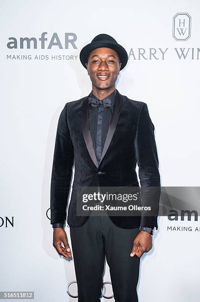 Aloe Blacc attends the 2016 amfAR Hong Kong gala with a guest at Shaw Studios on March 19, 2016 in Hong Kong, Hong Kong.