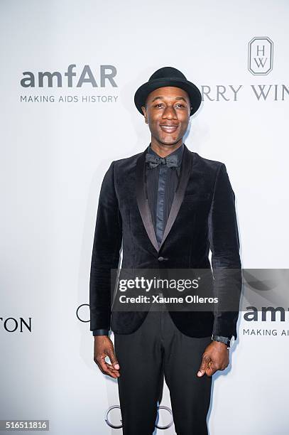 Aloe Blacc attends the 2016 amfAR Hong Kong gala with a guest at Shaw Studios on March 19, 2016 in Hong Kong, Hong Kong.