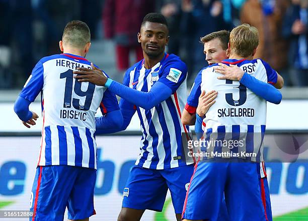 Salomon Kalou of Berlin jubilates with team mates after scoring the second goal during the Bundesliga match between Hertha BSC and FC Ingolstadt at...