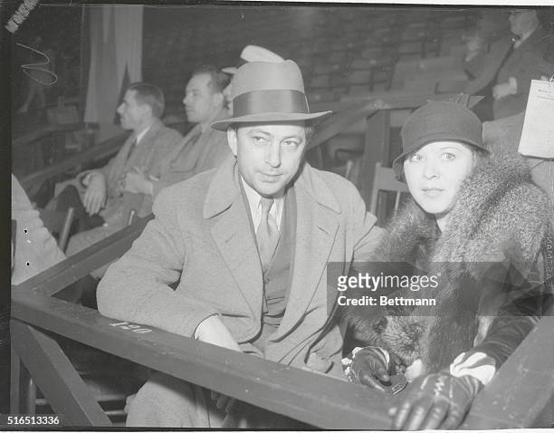 Fritzie Ridgeway, film actress, and her husband, Constantine Bokaleinikoff, musical director of Paramount and RKO studios, attend the six-day bike...