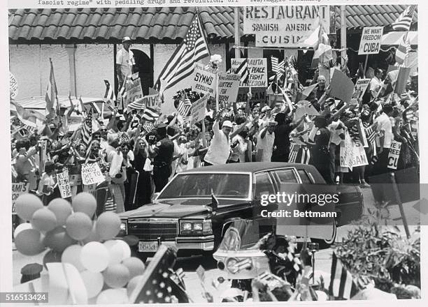 Miami: President Ronald Reagan's limousine passes through the heart of Miami's Little Havana, where thousands of enthusiastic Cuban exiles waved...