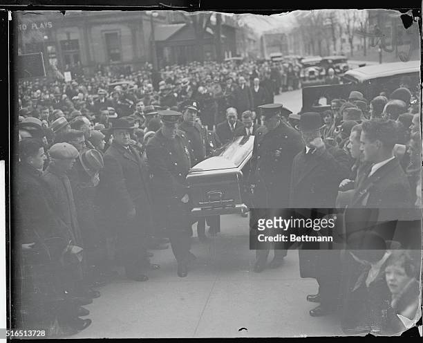 Casket of Coolidge Carried into Church. Close friends of the former president while he lived, six policemen of Northampton, Mass., carry the casket...