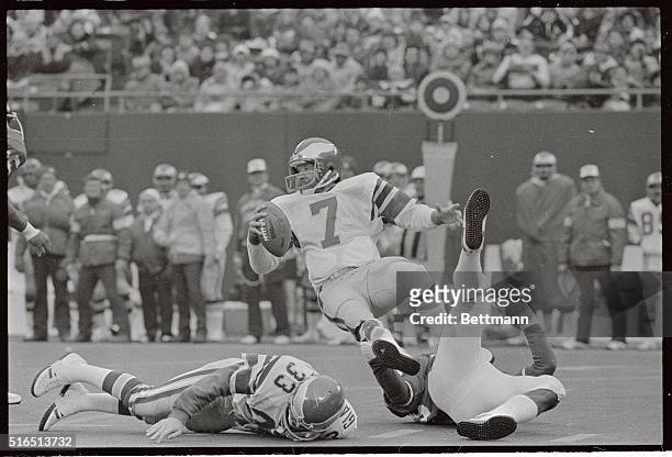 Lawrence Taylor of the New York Giants is shown here in action as he sacks Eagles quarterback Ron Jaworksi with one hand, in the second quarter.