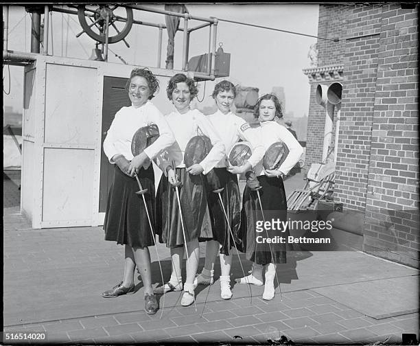 Women Fencers in Practice. The Intercollegiate Champion Women's Fencing team of the New York University practiced today on the roof of the London...