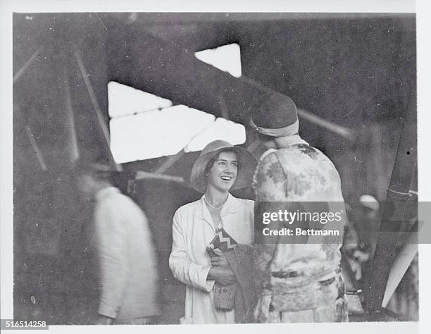 The exquisite charm and beauty of Mrs. Charles Lindbergh, is captured by the camera in this hitherto unpublished picture, for the first time. The...