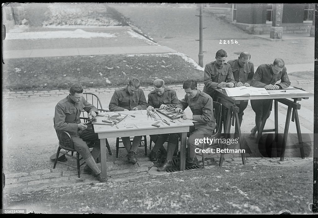 Officers Making Miniature Warships and Maps