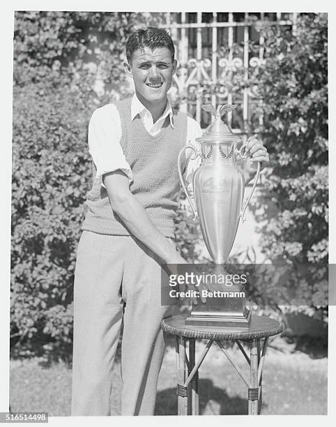 Wins Left-Handed Title. Fred Webb of Shelby, North Carolina, holds the trophy he received after winning the National Left Handed Golf Championship,...