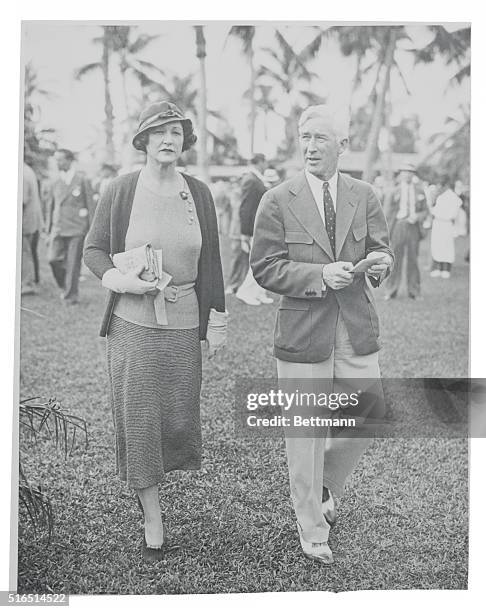 At Hialeah Opening. Mrs. R.W. Ralston and Gar Wood, famous speedboat racer, are seen here as they attended the opening of the Hialeah Park Racetrack...