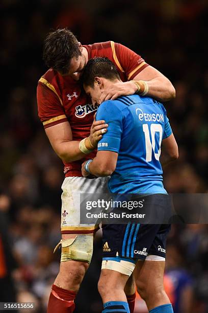 Dejected Tommaso Allan of Italy is consoled by Luke Charteris of Wales following the final whistle during the RBS Six Nations match between Wales and...