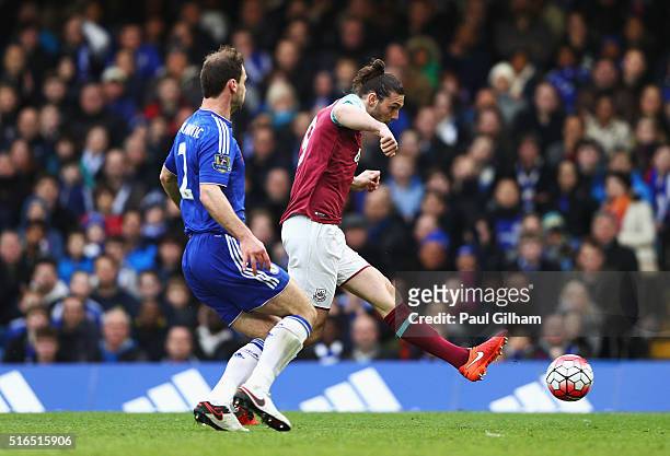 Andy Carroll of West Ham United scores his team's second goal during the Barclays Premier League match between Chelsea and West Ham United at...