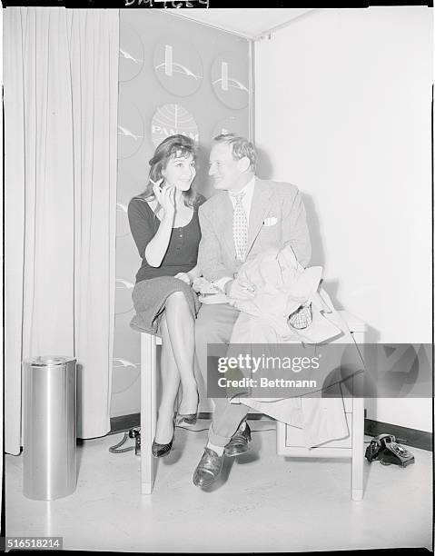 Juliette Greco and Howard Travor star of the The Roots of Heaven shown together upon arrival at Idlewild Airport.