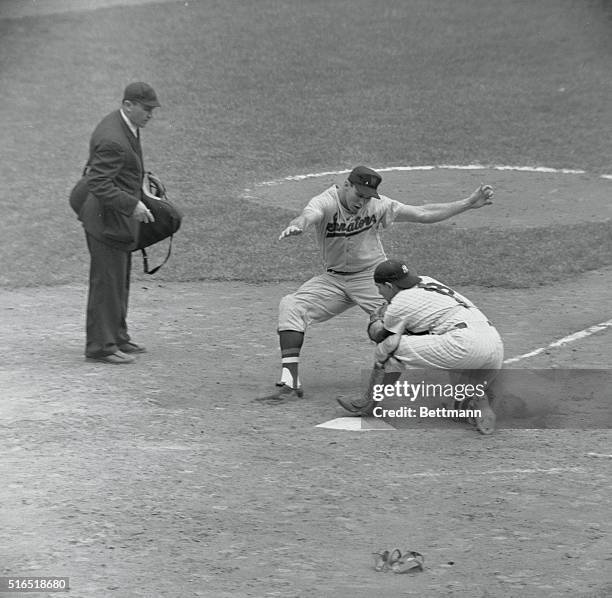 Bunt-Line Special. Bob Allison is gunned down at home on Camilo Pasqual's 5th inning bunt. Yogi Berra takes the throw from Bill Skowron. Yanks lost...