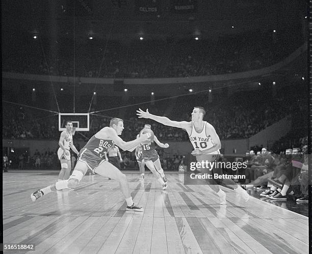 Knicks vs. Celtics. Madison Square Garden. New York, New York: Dave Budd of the Knicks and Frank Ramsey fight for the ball. November 17, 1961.