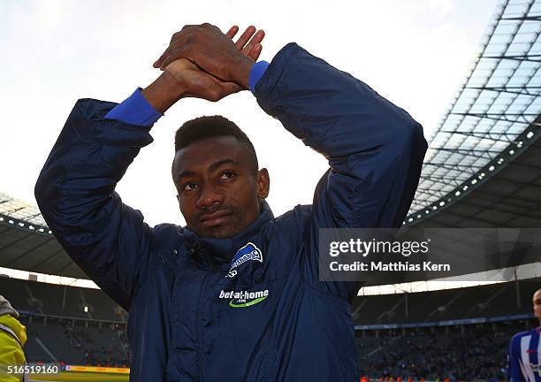 Salomon Kalou of Berlin celebrates with supporters after winning the Bundesliga match between Hertha BSC and FC Ingolstadt at Olympiastadion on March...