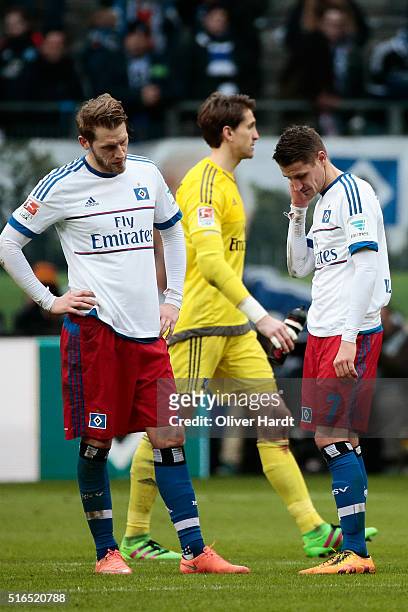 Aaron Hunt and Ivo Ilicevic of Hamburg appears frustrated after the Bundesliga match between Hamburger SV and 1899 Hoffenheim at Volksparkstadion on...