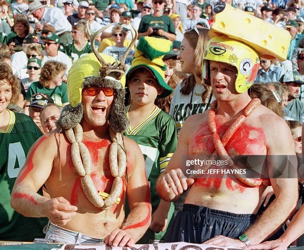 Green Bay Packers fans Jesse Buechel (L) and T.J.