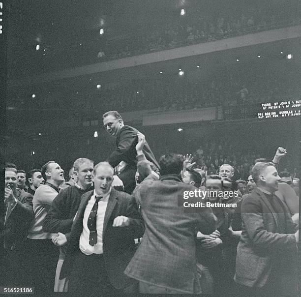 New York, New York: His Kelly Greens Made A Mole Hill Out Of A Mountain: Jaspers' coach rides high , after his boys upset West Virginia in NCAA clash.