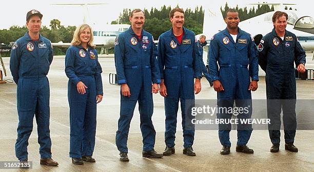 Space Shuttle Discovery crew members, from left, Stephen Robinson, Jan Davis, Commander Curtis Brown, Pilot Kent Rominger, Robert Curbeam and...