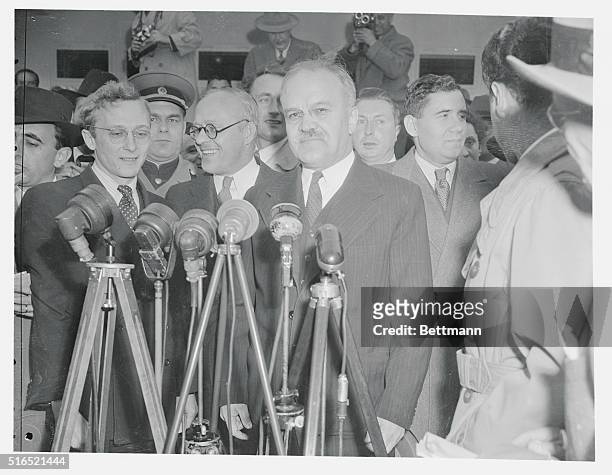 Arriving in New York on the liner, Queen Elizabeth, and attending a press conference are USSR's Foreign Minister Molotov, Ambassador Novikov, UN...