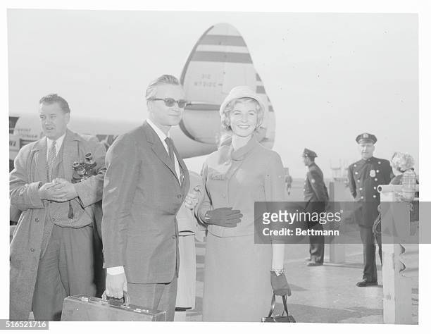 Lars Schmidt with Bergman’s daughter, Pia Lindström, at Idlewild Airport on their arrival in New York, 8th April 1959.
