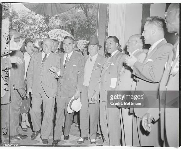 Confident Teammates. Saratoga Springs, New York: Arriving at site of Republican State Convention, Governor Dewey enters Grand Union Hotel, Saratoga,...