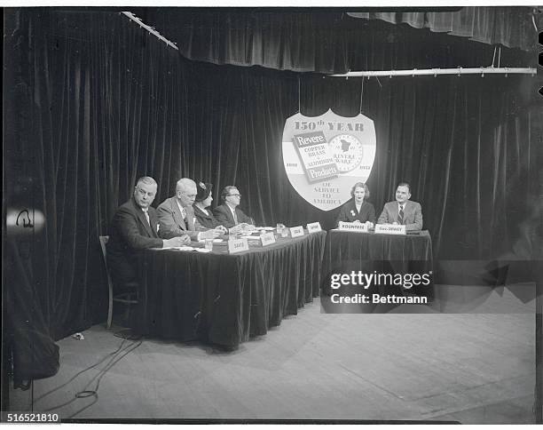 Governor Dewey. New York, New York: Press consists of, left to right, Murray Davis, World Telegram-Sun; Marshal McNeil, Scripps-Howard; May Craig,...