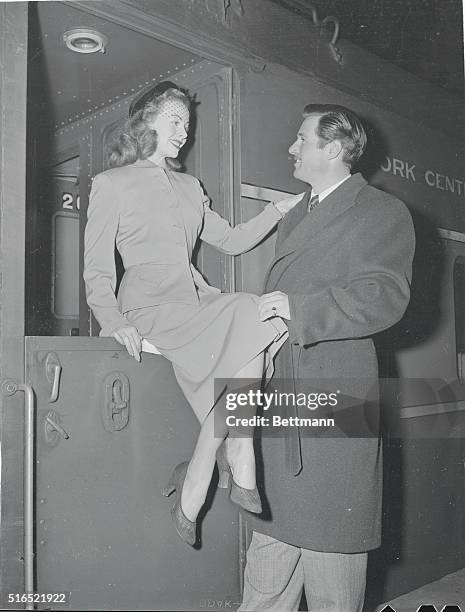 Hollywood arrivals at Grand Central are actress Jeanne Crain and hubby, Paul Brinkman. Objective: radio shows and vacation. He put her on a...