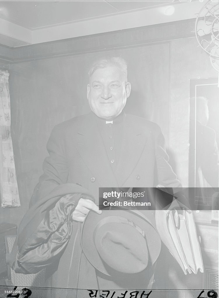 Archbishop Richard J. Cushing Posing with Hat and Coat
