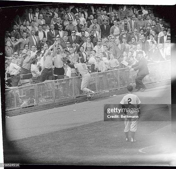 All hands strength for Yankee's Bobby Richardson's sixth inning foul ball during, May 21st, game against Baltimore Orioles at Yankee Stadium....