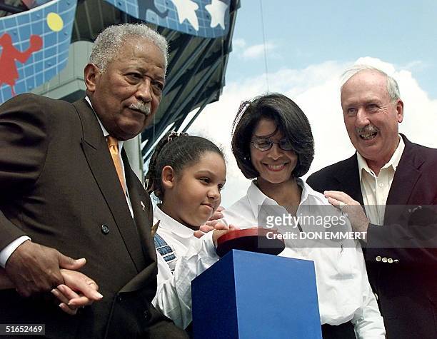 Former New York City Mayor David Dinkins , Camera Ashe , daughter of tennis great Arthur Ashe, Jeanne Ashe , wife of Arthur Ashe and USTA President...