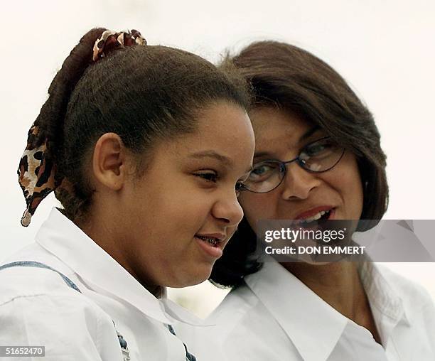 Camera Ashe , daughter of tennis legend Arthur Ashe, and Jeanne Ashe, wife of Arthur Ashe, talk during the opening ceremony of the Arthur Ashe...